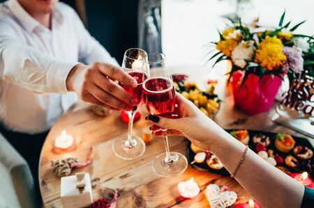 a couple drinking champagne on a dateの写真素材