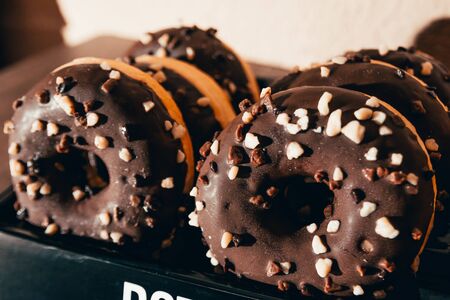 chocolate donuts close up view at the coffee shopの写真素材