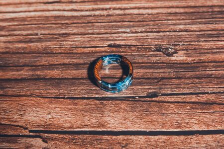 magical ring with blue stains. an old antique. family ringの写真素材