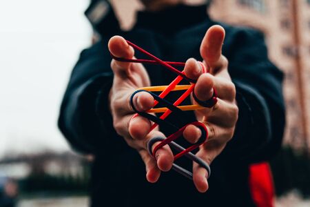 conundrum with fingers. untangle concept. develop mentally. brain gameの写真素材