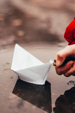 paper boat on fire. destroy your dreamsの写真素材