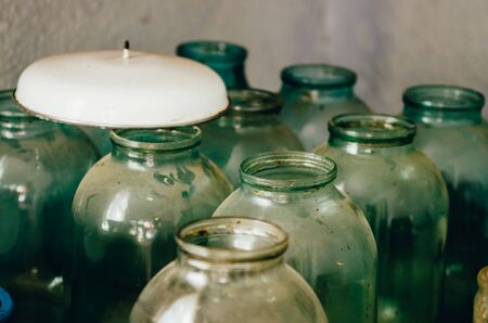 old glass jars in the basement. old fashioned lifeの写真素材