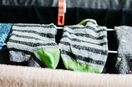 Laundry is dried behind the balcony . Socksの写真素材