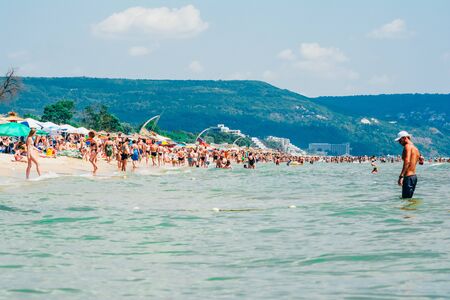 Bulgarian beach full of tourists for vacation big aglomerationの写真素材