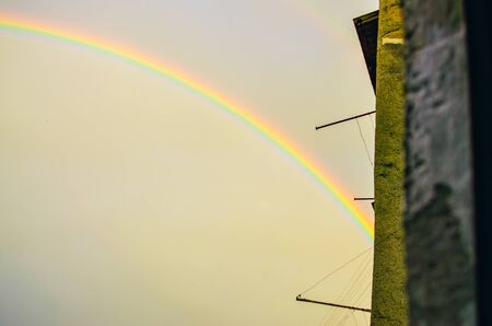 beautiful rainbow after rain in the skyの写真素材