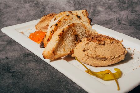 wooden cutting board with fried toasts. appetizer for restaurant menuの写真素材