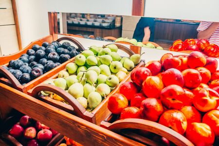 different ripe fruits on the buffet table at the hotel . plums apples peaches , healthy lifestyle concept.の写真素材