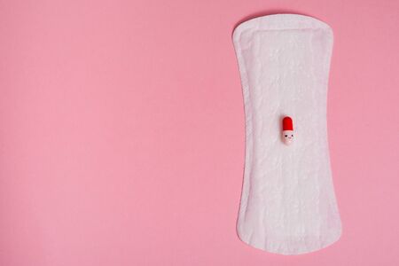 used female menstruation pads on a pink background . women critical days , gynecological...