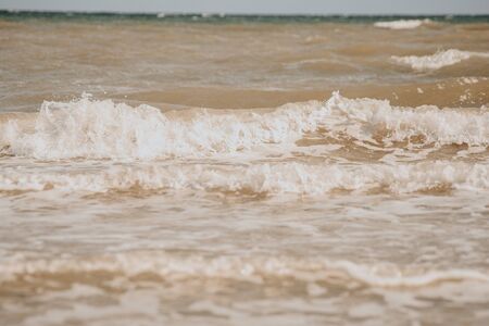 Abstract blue sea water with white foam for background, nature background conceptの写真素材