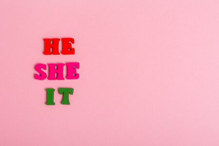 pronouns with colored wooden letters he , she , it   .の写真素材