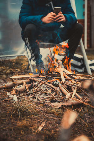 bonfire on the ground with close friendsの写真素材