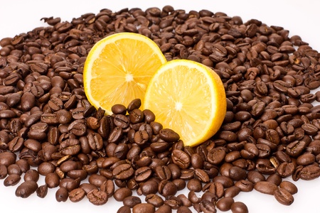 coffee beans with lemon on the white backgroundの写真素材