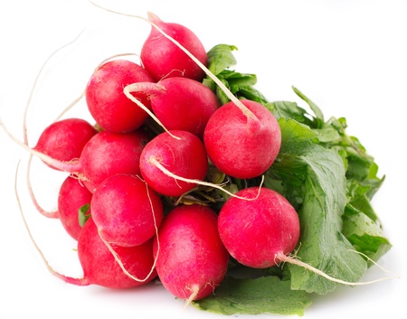 fresh radish with leaves isolated on white backgroundの写真素材