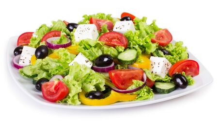 fresh vegetable salad isolated on white backgroundの写真素材