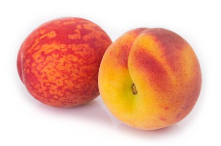 fresh peaches isolated on white backgroundの写真素材