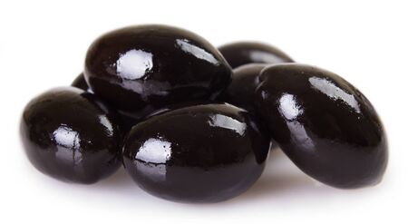 black olives isolated on white backgroundの写真素材