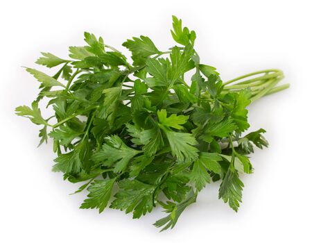 fresh parsley isolated on white backgroundの写真素材