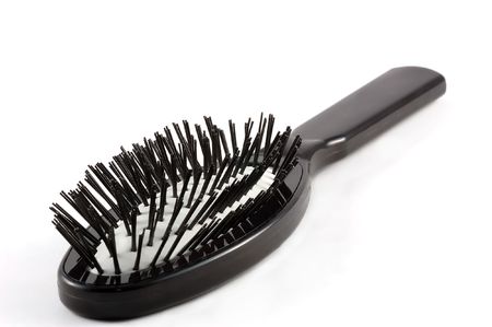 Black comb isolated on whiteの写真素材
