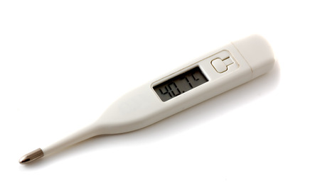 Digital thermometer close-up isolated over a white background
