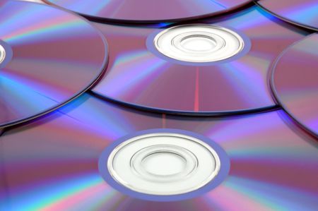 background of some colorful compact discs