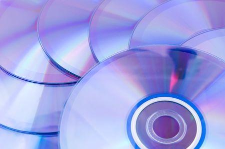 background of some colorful compact discs