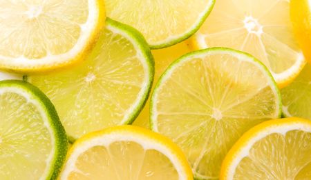 Lemon and lime slices abstract backgroundの写真素材