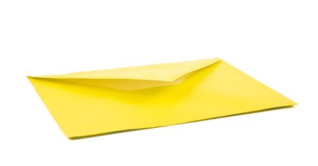 yellow envelope isolated on whiteの写真素材