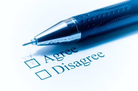 Tickbox with a blue cross on Agreevan a ballpointer

の写真素材