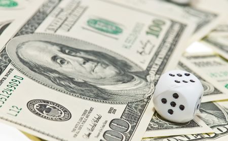 Pair of dice on money
