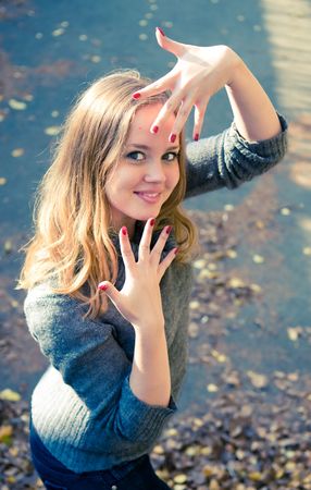 Young woman outdoors portrait. の写真素材