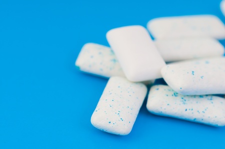 Chewing gums on blue の写真素材
