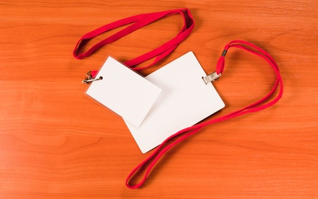 Identity cards on wooden tableの写真素材