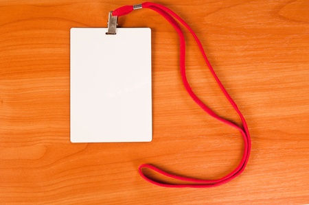 Identity card on wooden tableの写真素材