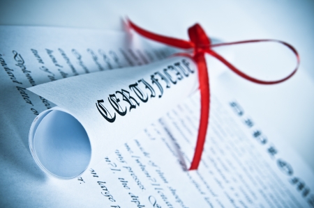 Diploma with red ribbon 