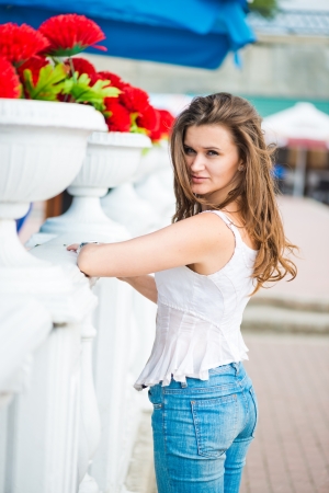 Portrait of a beautiful european woman smiling outdoors の写真素材