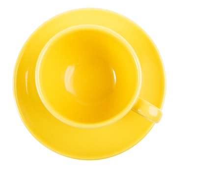 Yellow empty cup isolated on white. の写真素材