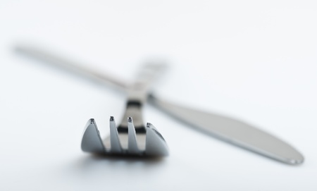 Knife and fork on white backgroundの写真素材