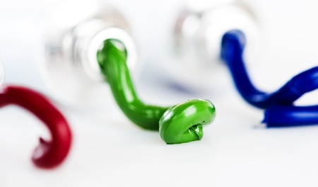 acrylic paint in tubes isolated on white の写真素材