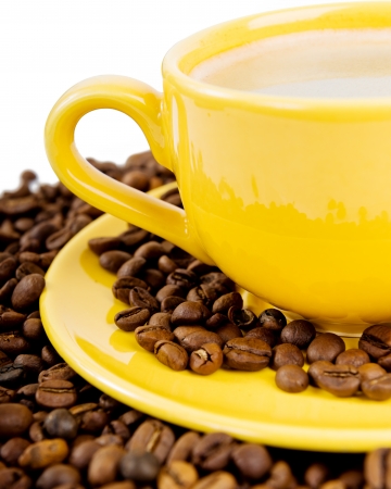 Coffee cup and beans on a white background. の写真素材
