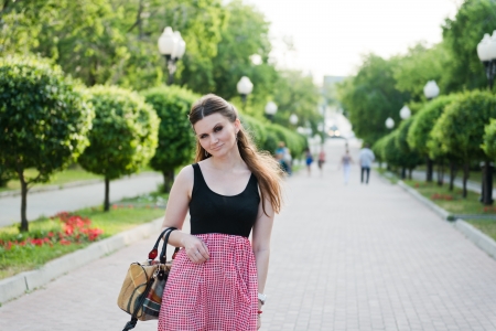 Pretty young woman outdoor with smoky eye makeup の写真素材