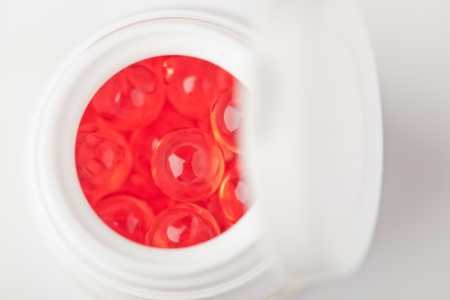 yellow transparent medicine in container の写真素材