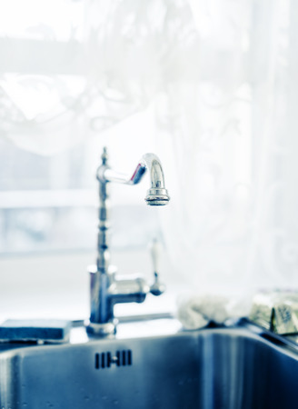 Water tap in the kitchen の写真素材