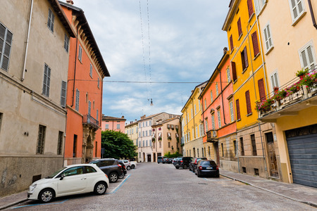 PARMA, ITALY -JULY 20 2014: Old beautiful nice street in Parma. Italy. Parma is a city in the Italian region of Emilia-Romagna famous for its prosciutto (ham)のeditorial素材