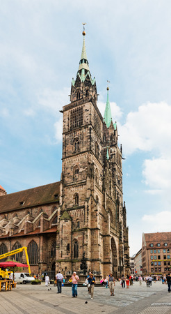 NUREMBERG, GERMANY JULY 22: Towers of St. Sebaldus Church in Nuremberg, Germany. Nuremberg accommodates annually more than 2 millions tourists のeditorial素材