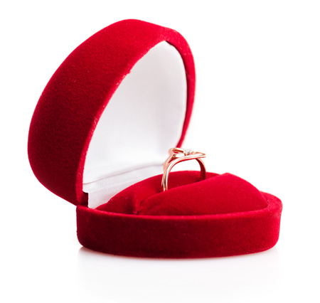 wedding rings in a gift box on white backgroundの写真素材
