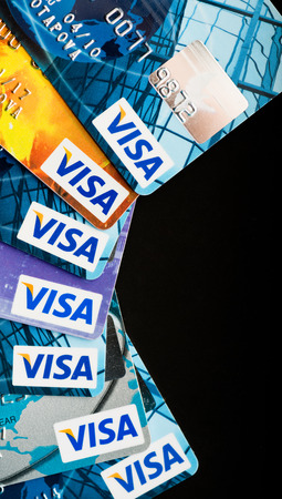 YEKATAERINBURG, RUSSIA - JAN 07, 2015: Pile of Visa credit cards. Visa is biggest credit card companie in the world.のeditorial素材