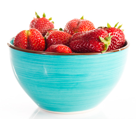 Bowl of strawberry with fresh berry isolated on white backgroundの写真素材