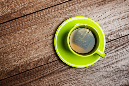 green cup of tea
