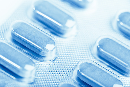 Blue tablet pills in blisterの写真素材