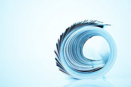 magazine roll on white backgroundの写真素材